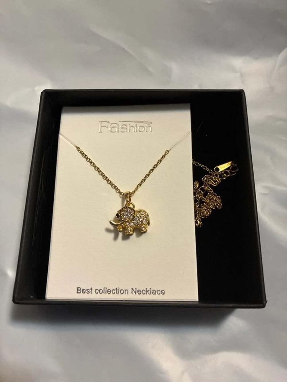 New in box fashion necklace elephant pendant gold tone rhinestone